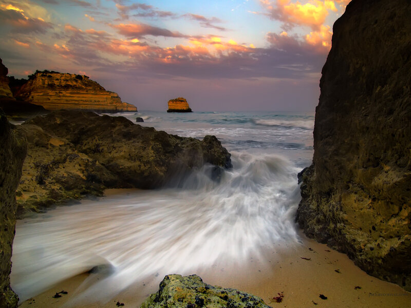 Sunset at rocky beach