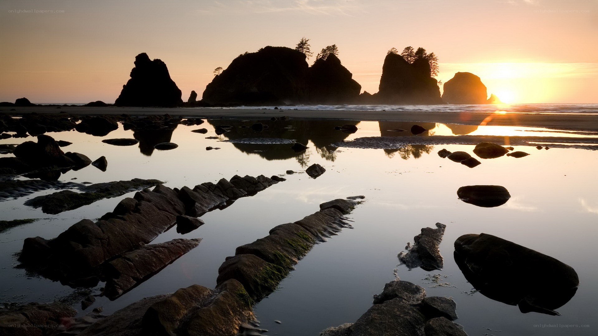 Sunset at rocky beach