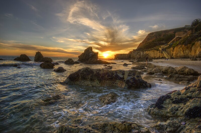 Sunset at rocky beach