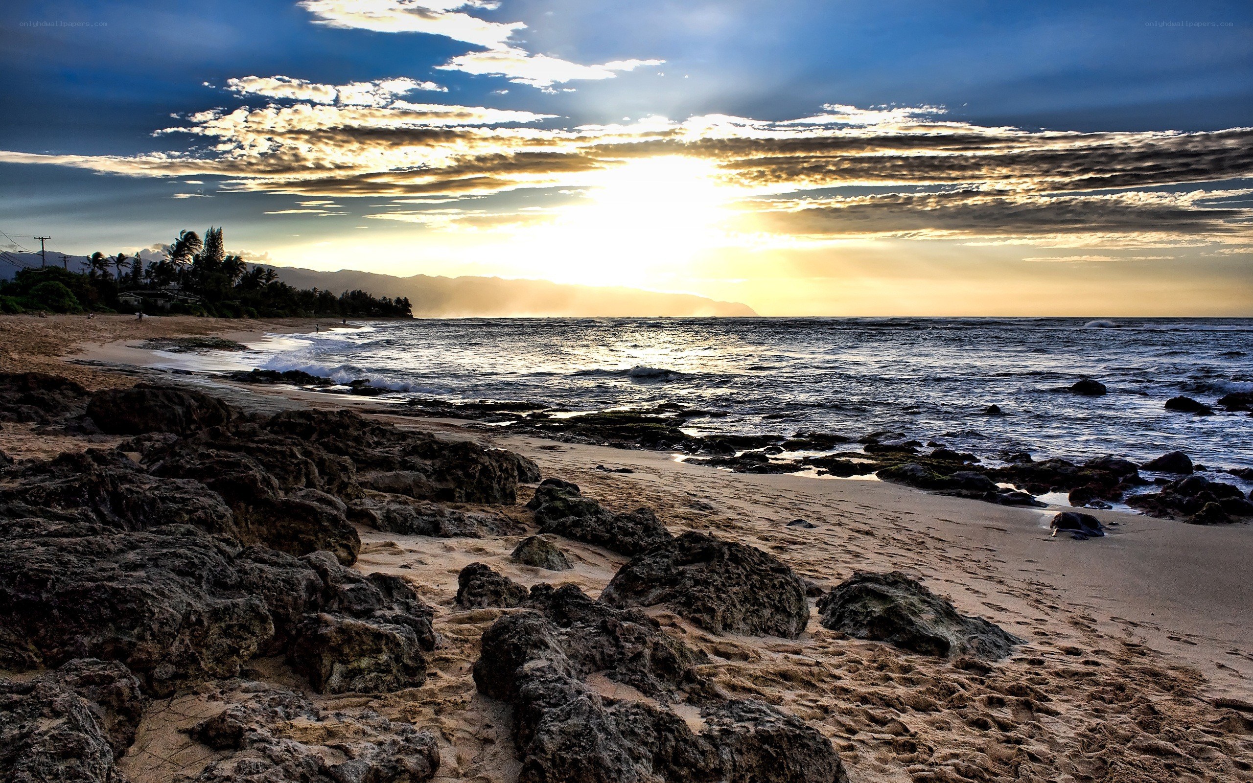 Sunset at rocky beach
