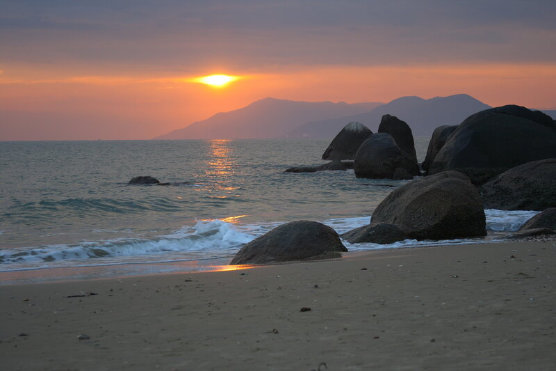 Sunset at Rocky Beach — Orange, Serene, Photograph, Mountains