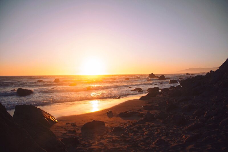 Sunset at Rocky Beach — Orange, Serene, Photograph, Ocean, Rocks, Sand