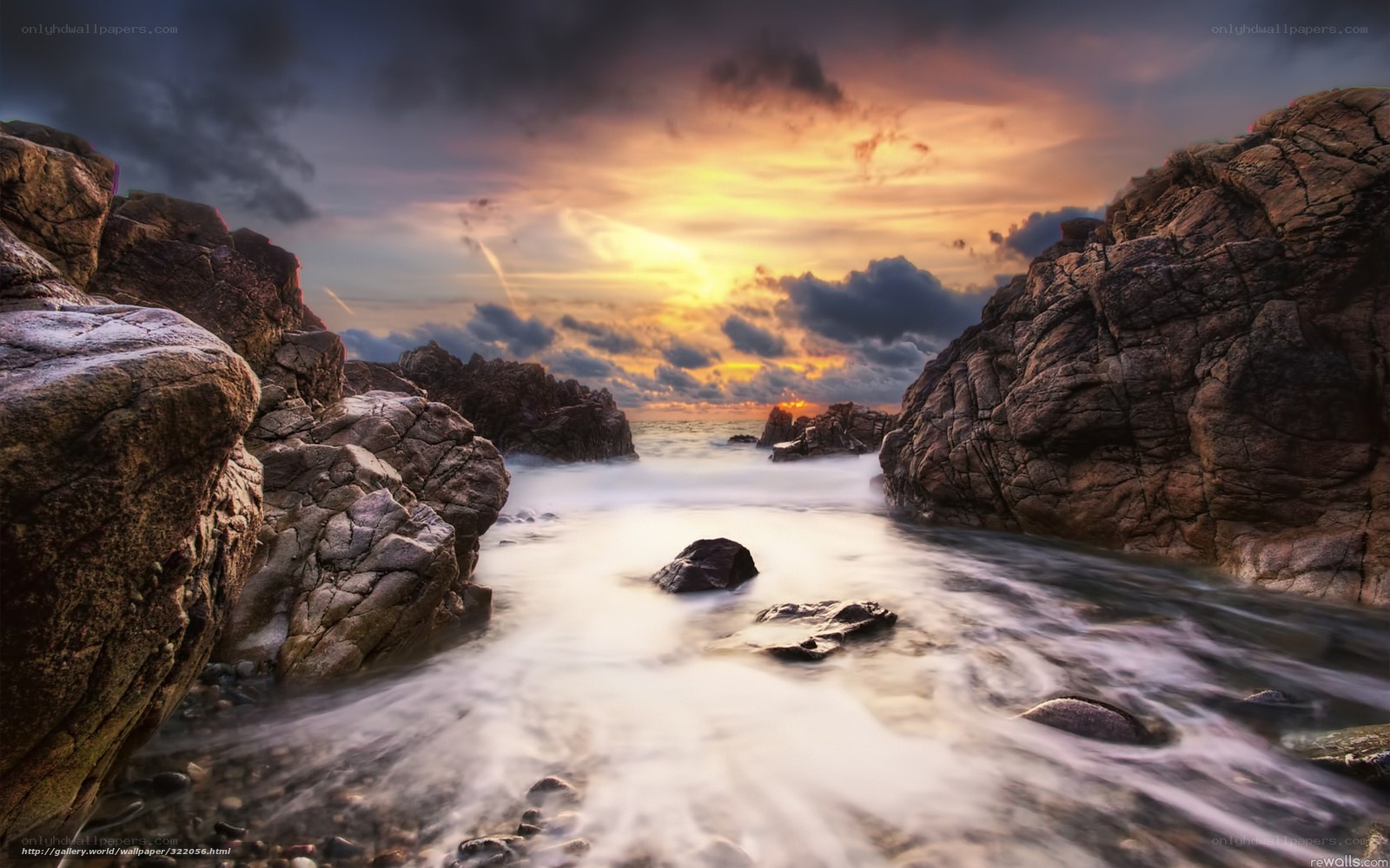 Sunset at rocky coastline