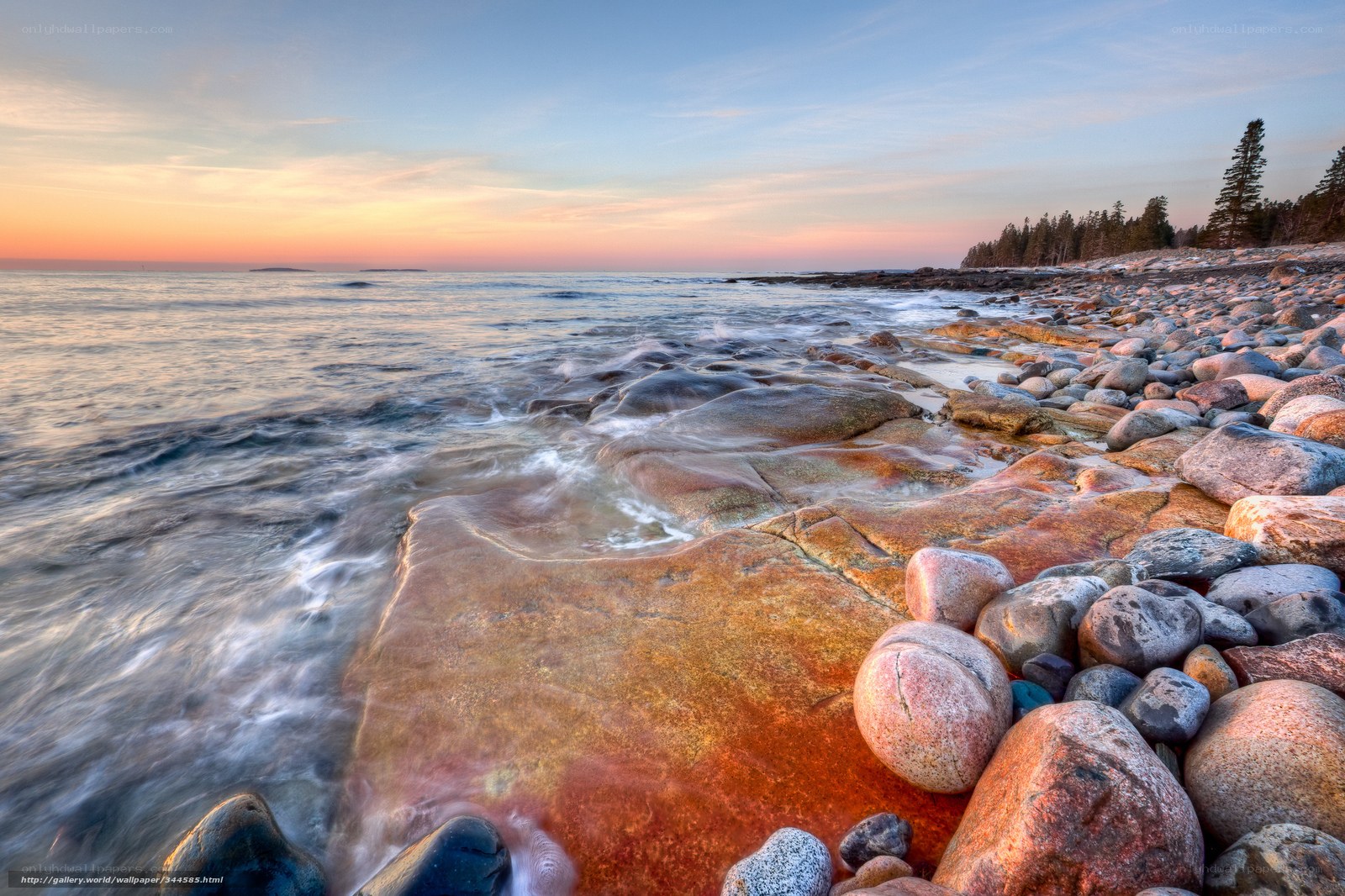 Sunset at rocky coastline