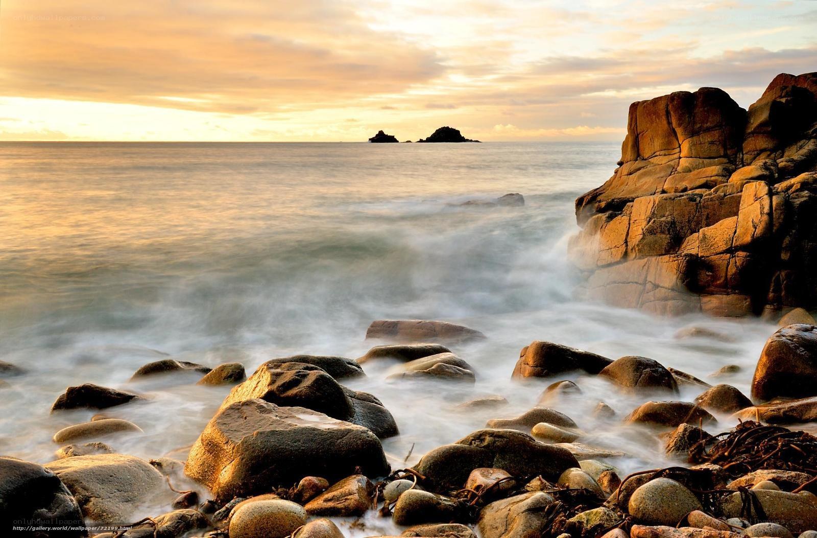 Sunset at rocky coastline