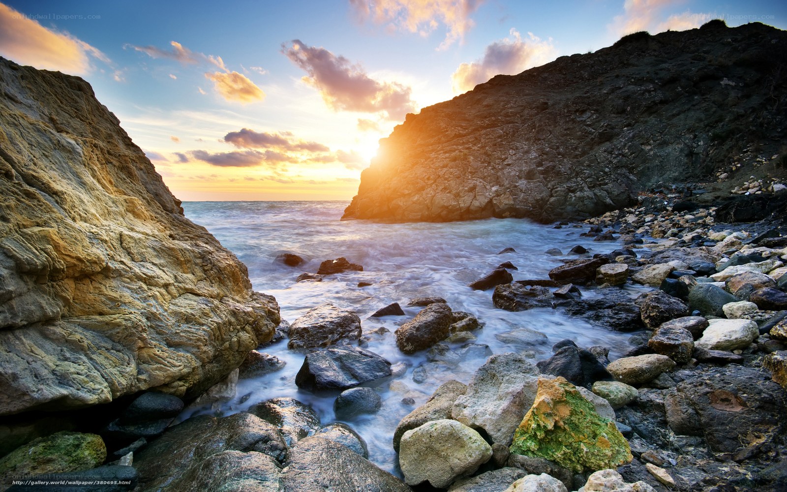 Sunset at rocky coastline