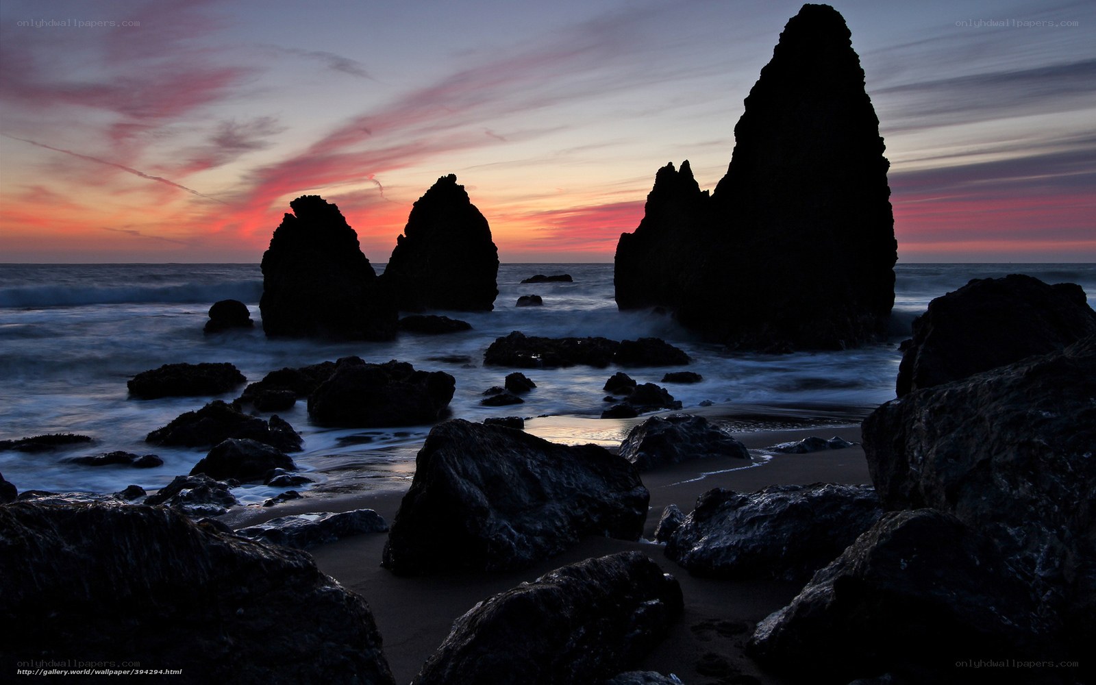 Sunset at rocky coastline