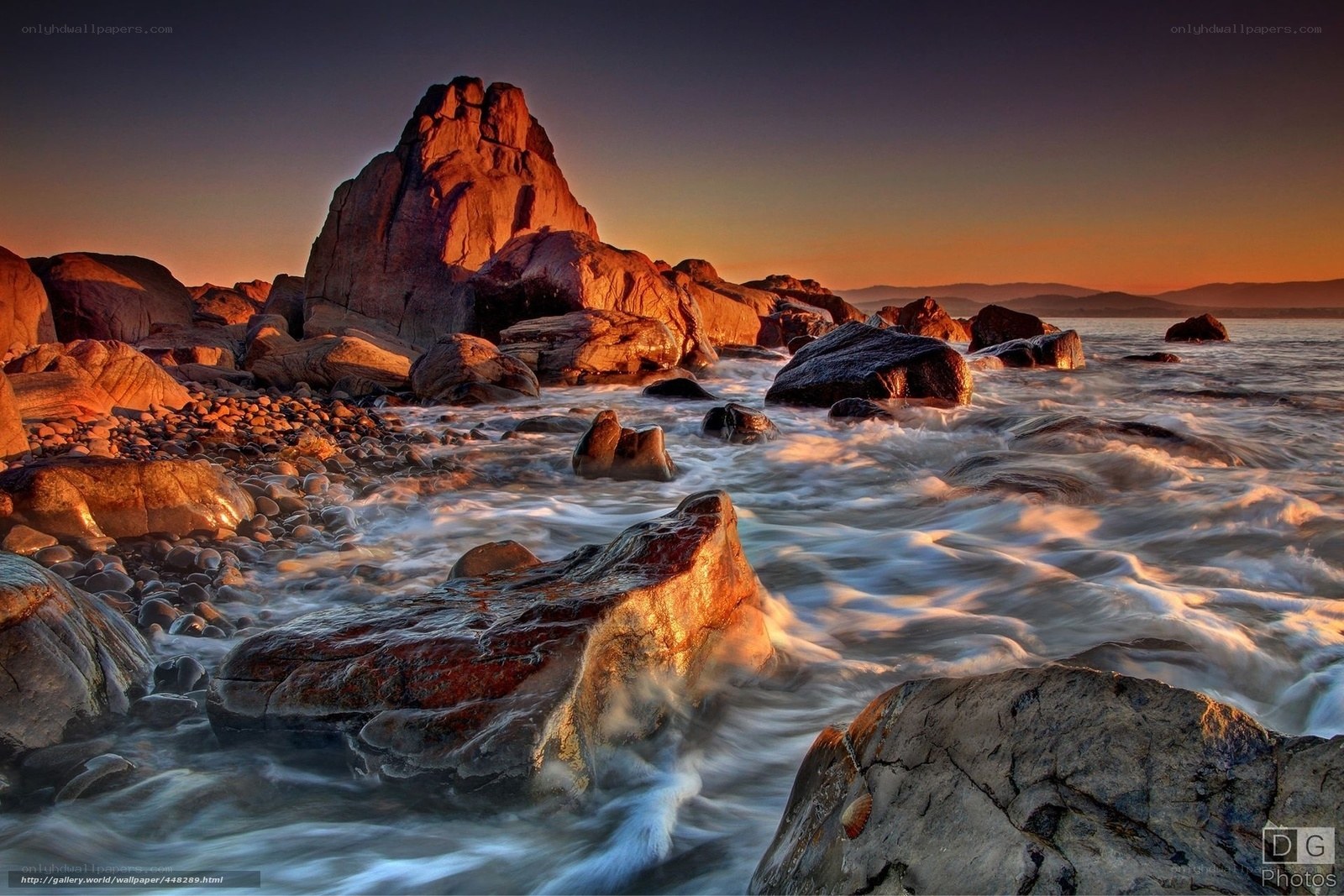 Sunset at rocky coastline