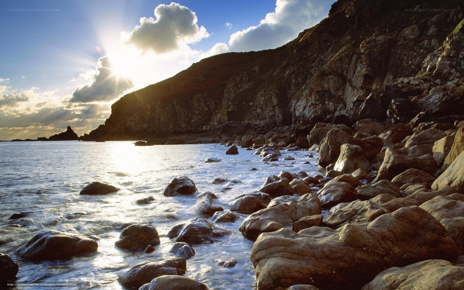 Sunset at rocky coastline
