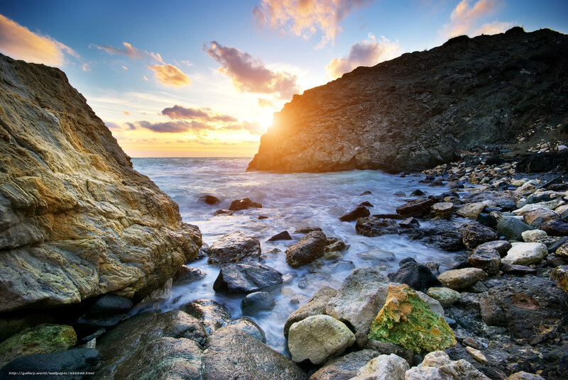 Sunset at rocky coastline