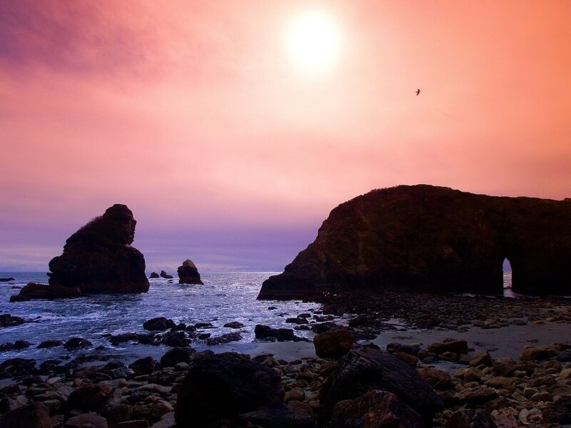 Sunset at rocky coastline