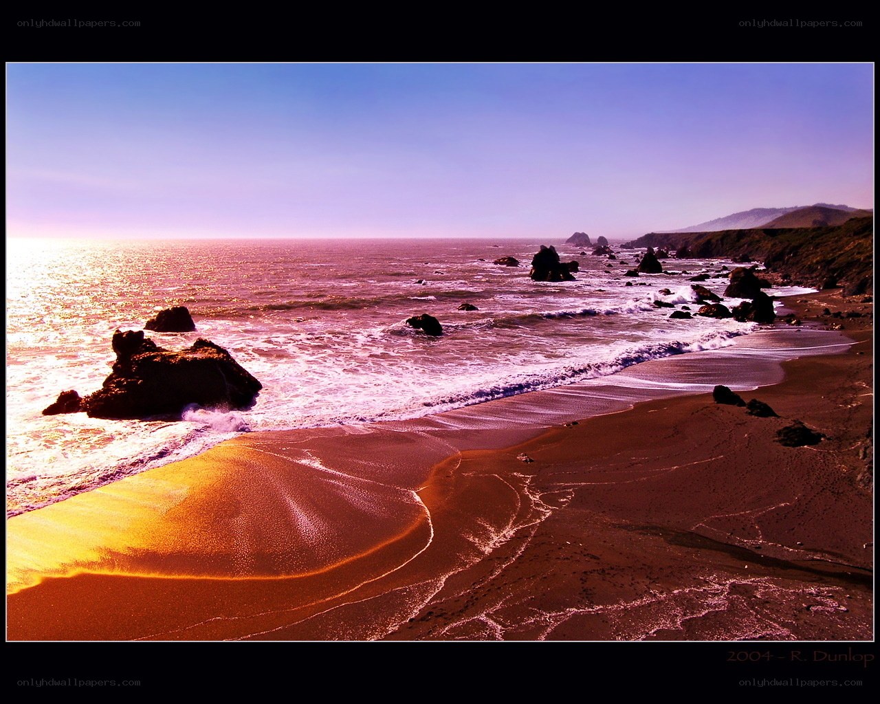 sunset at rocky coastline