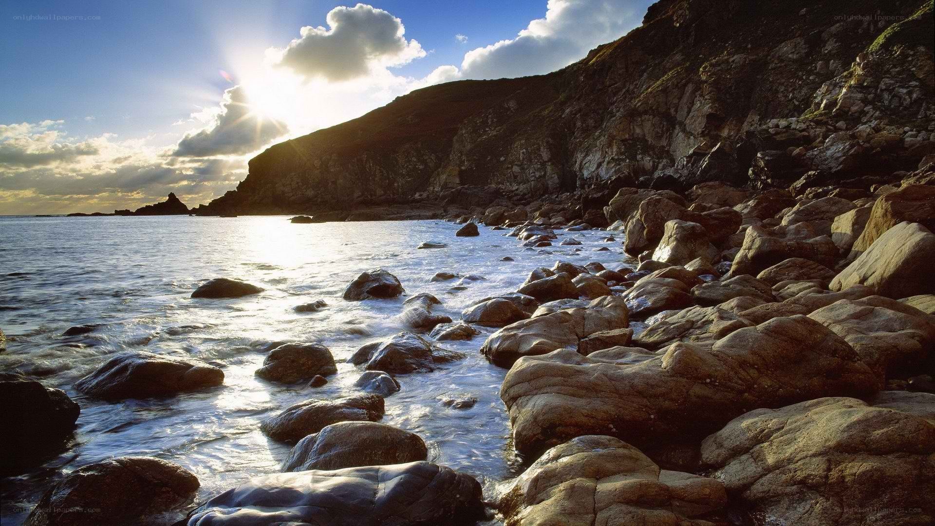 Sunset at rocky coastline