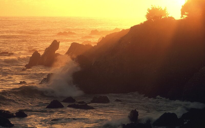 Sunset at rocky coastline