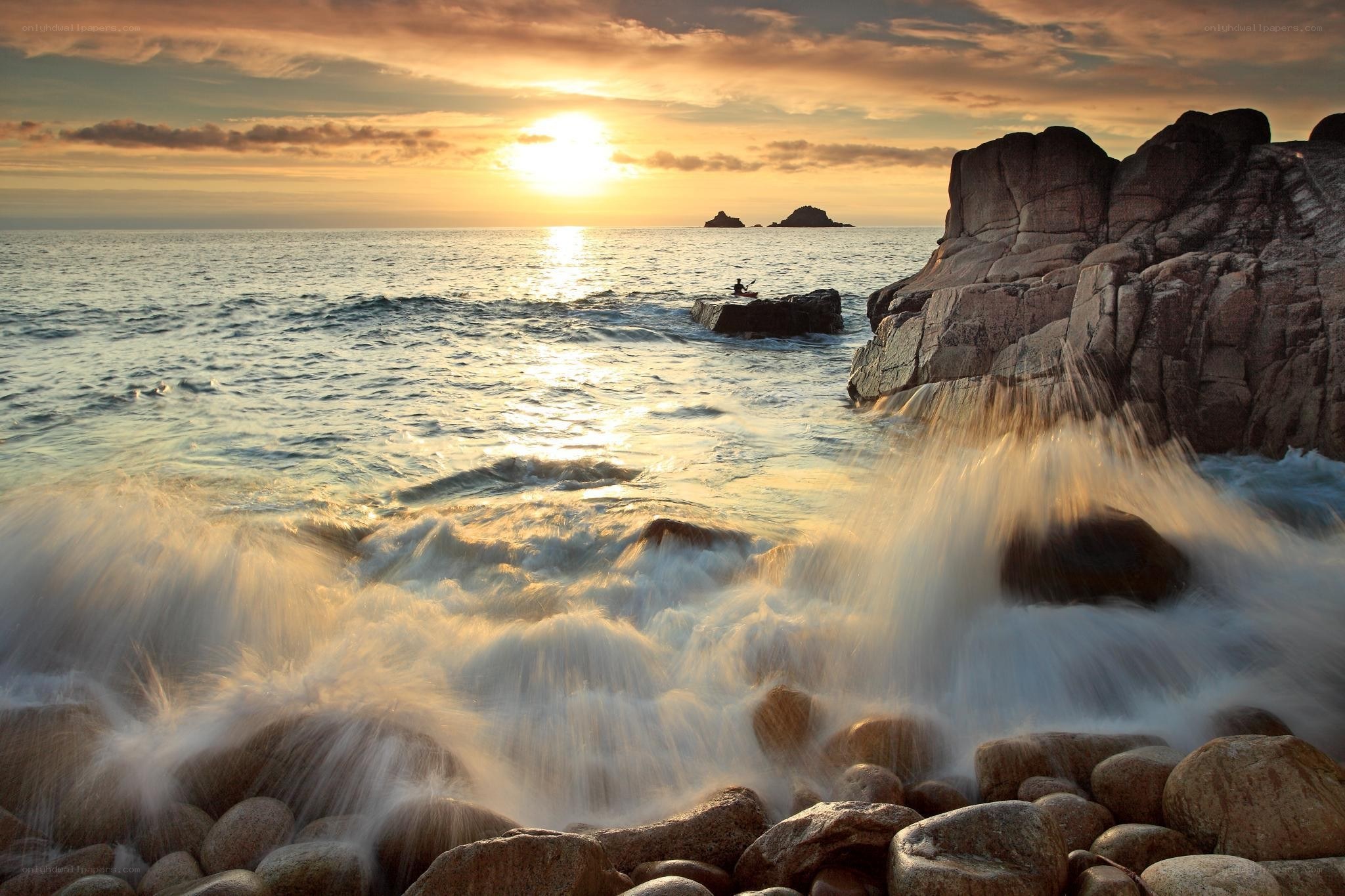 Sunset at rocky coastline