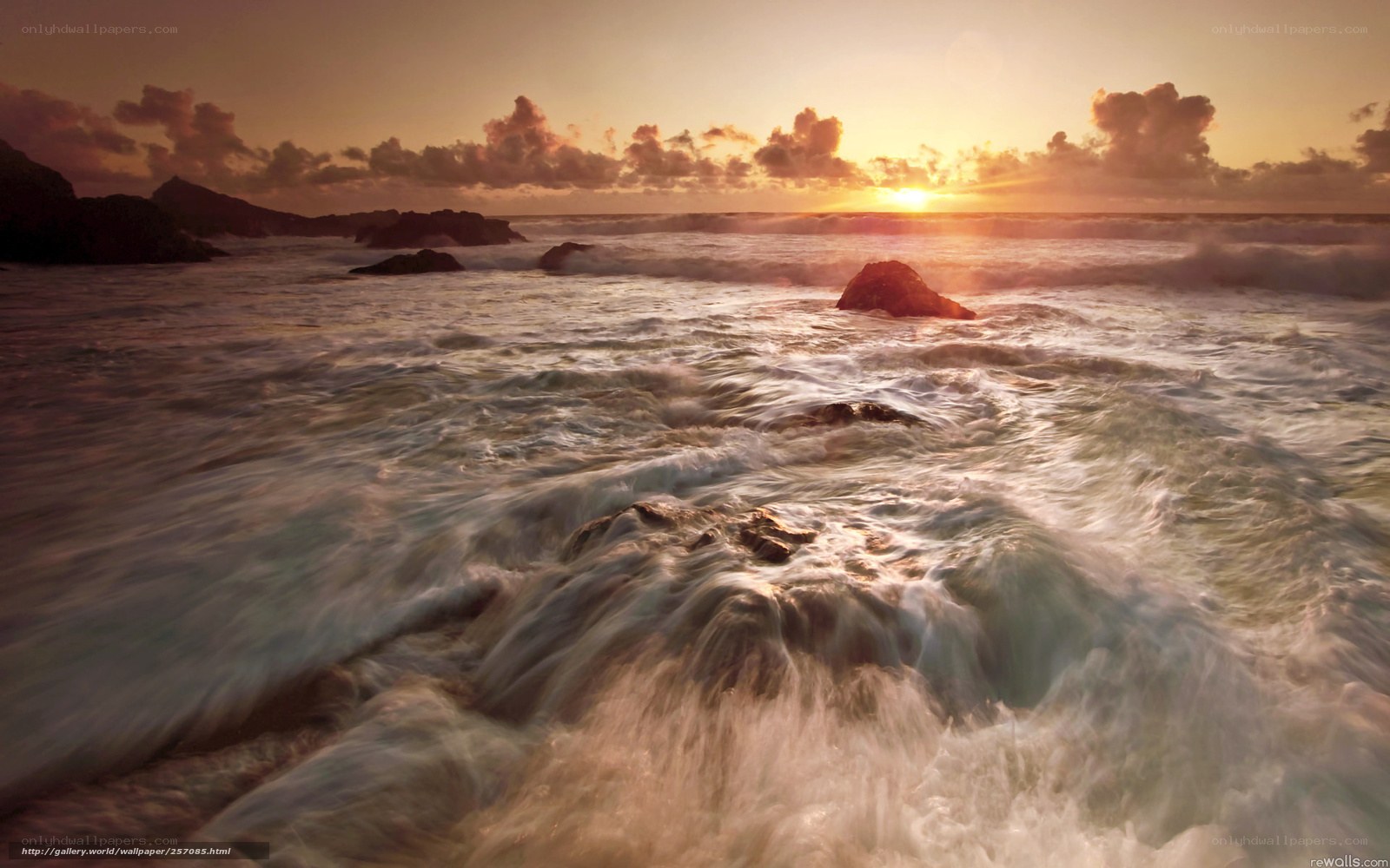 Sunset at rocky coastline