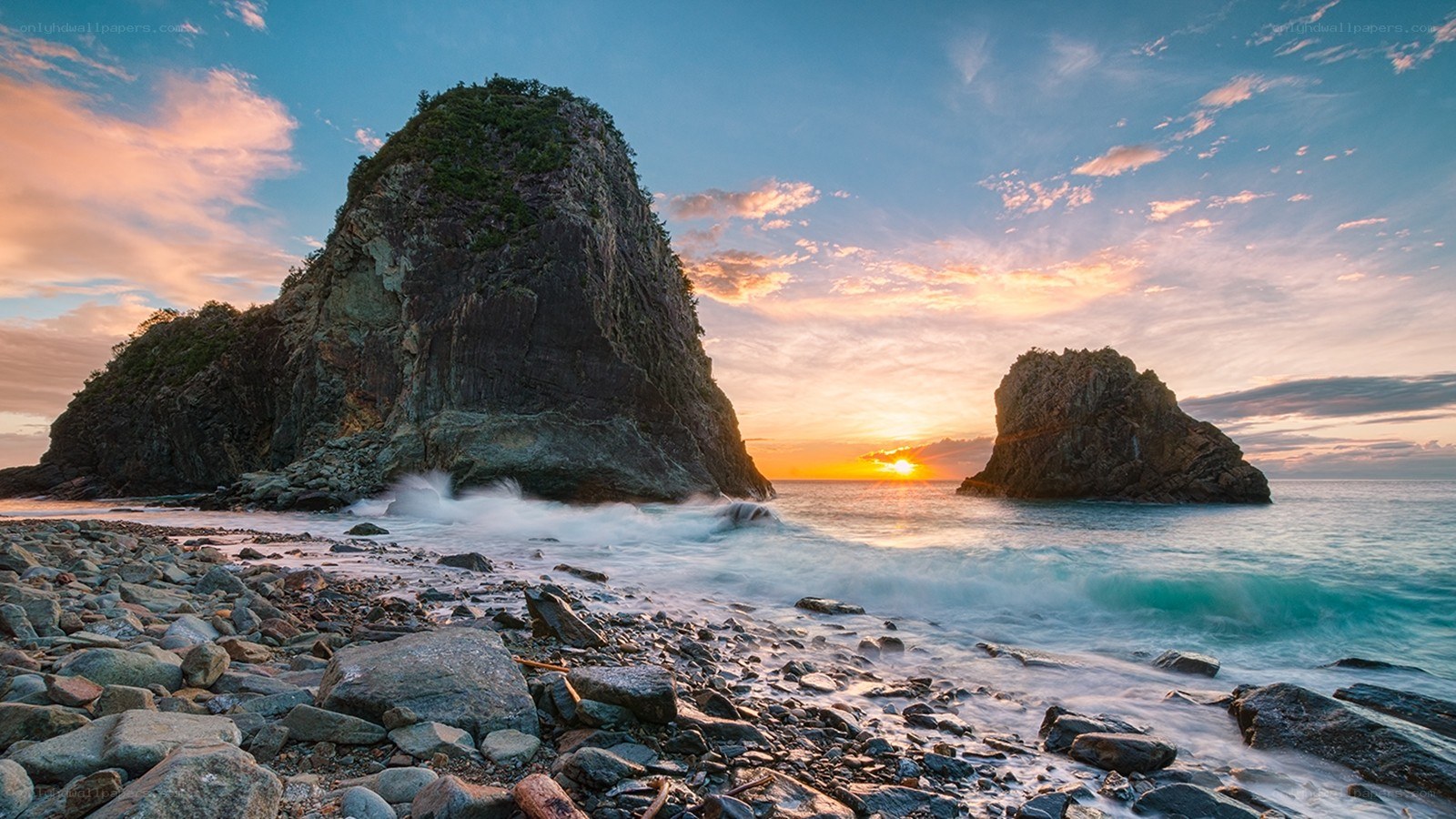 Sunset at rocky coastline