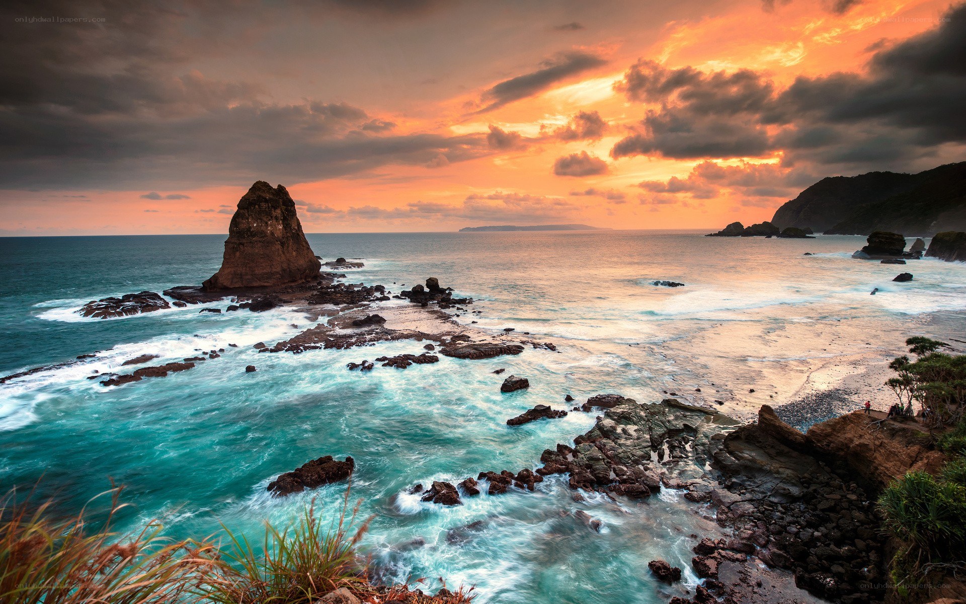 Sunset at rocky coastline