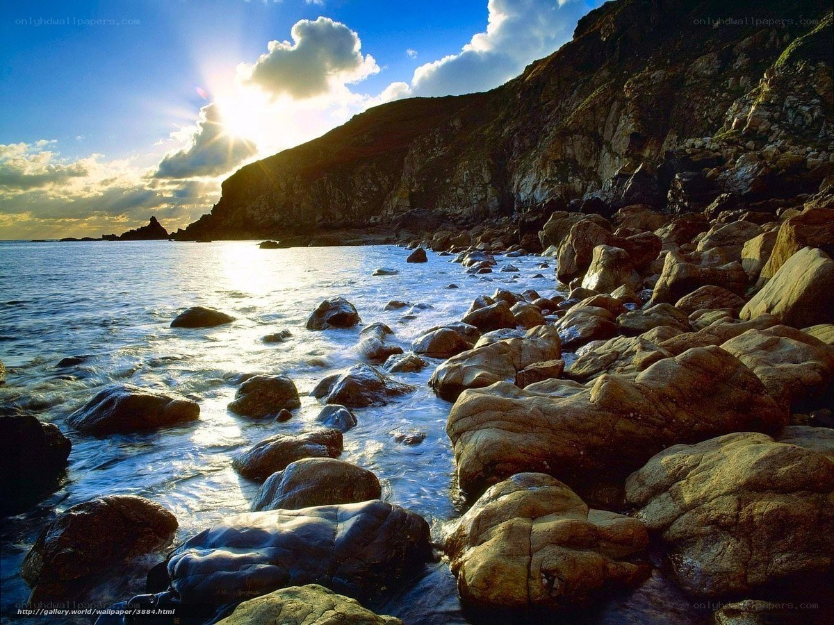 Sunset at rocky coastline