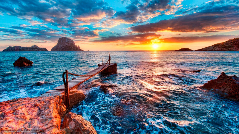 Sunset at rocky pier
