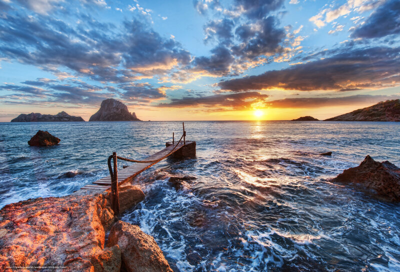 Sunset at rocky pier