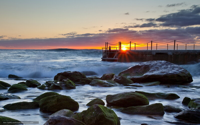 Sunset at Rocky Pier — Orange, Serene, Photograph