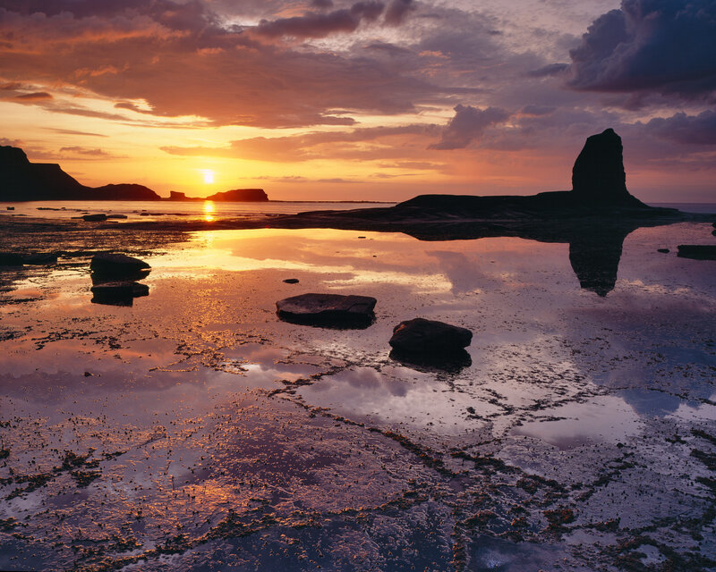 Sunset at sea stack formation