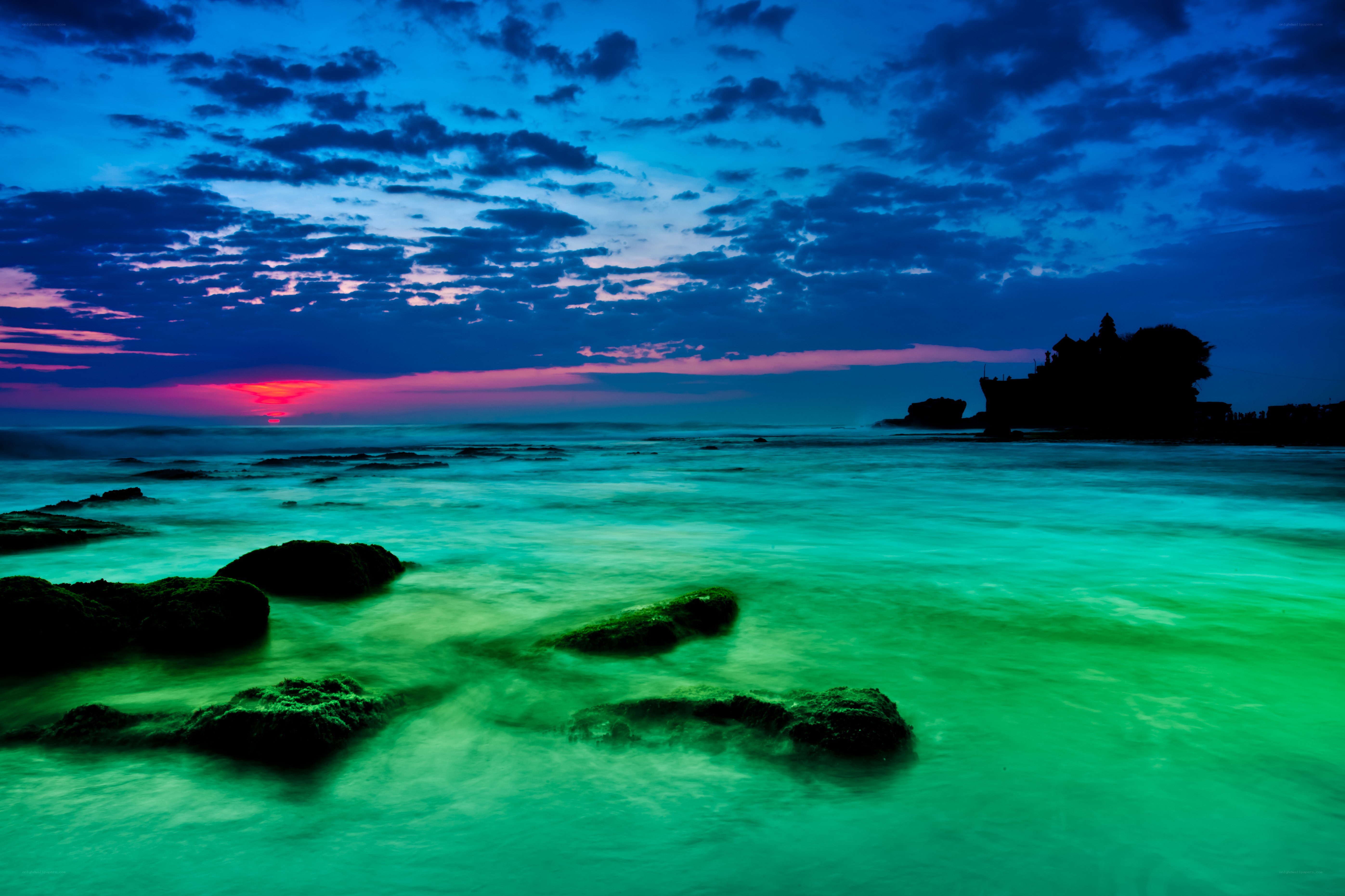 sunset at tanah lot temple