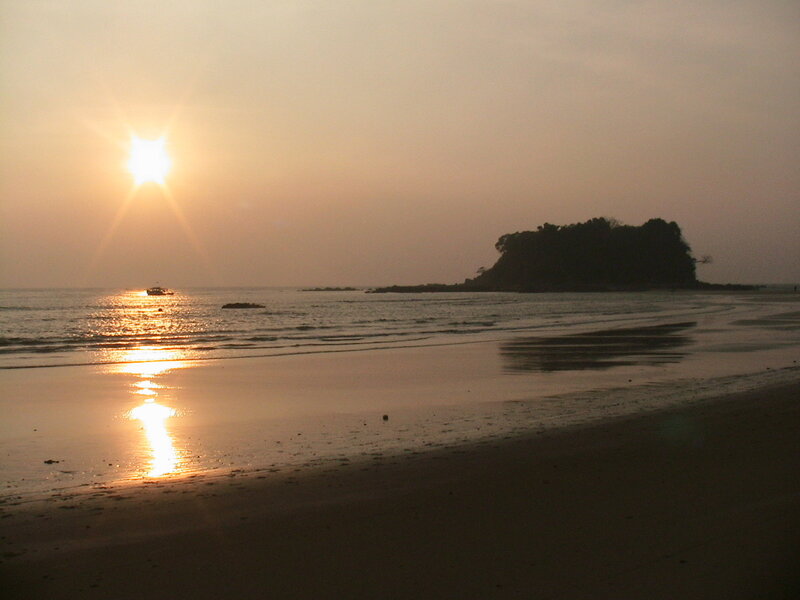 Sunset at the beach with a small island