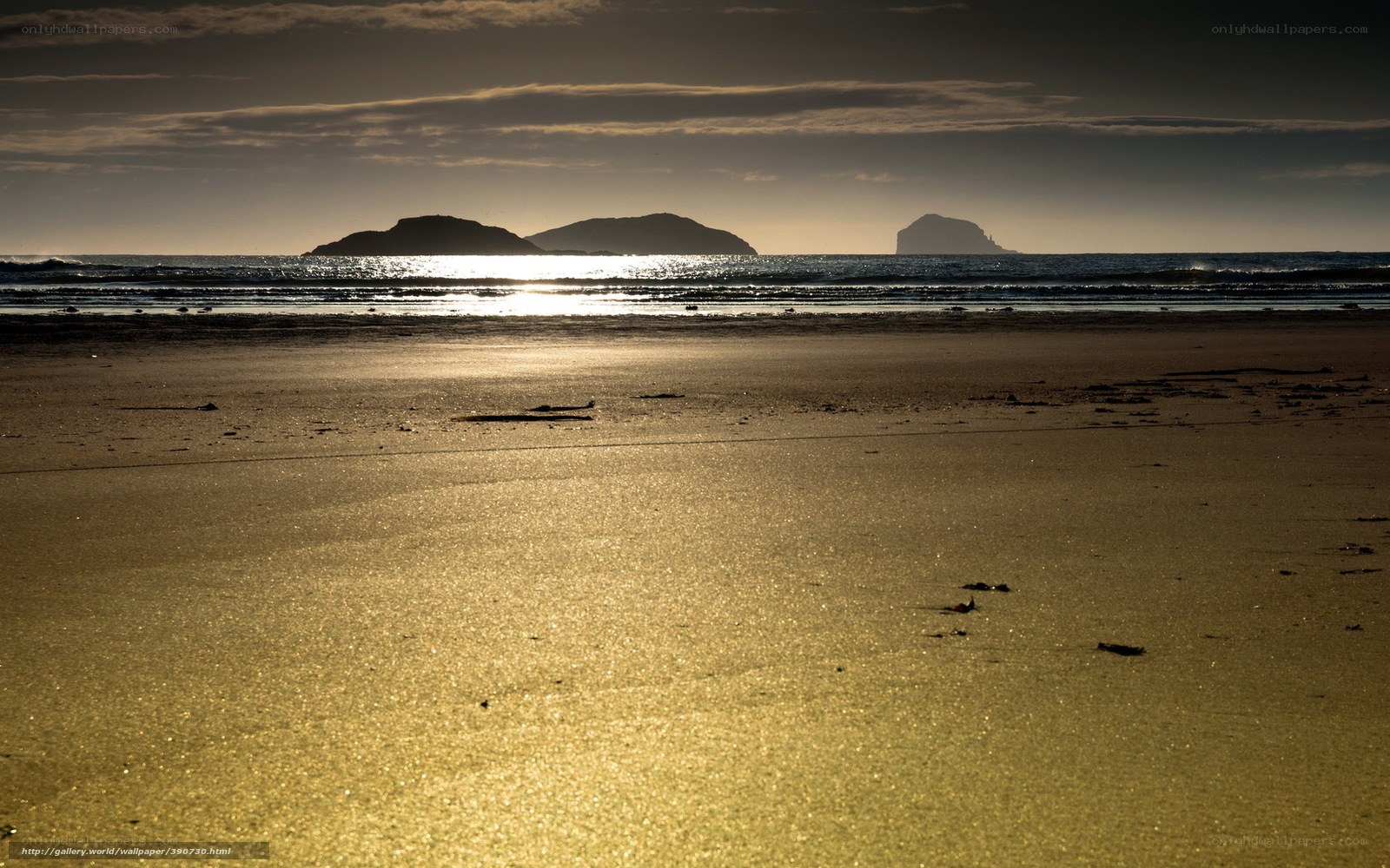 Sunset at the beach with islands