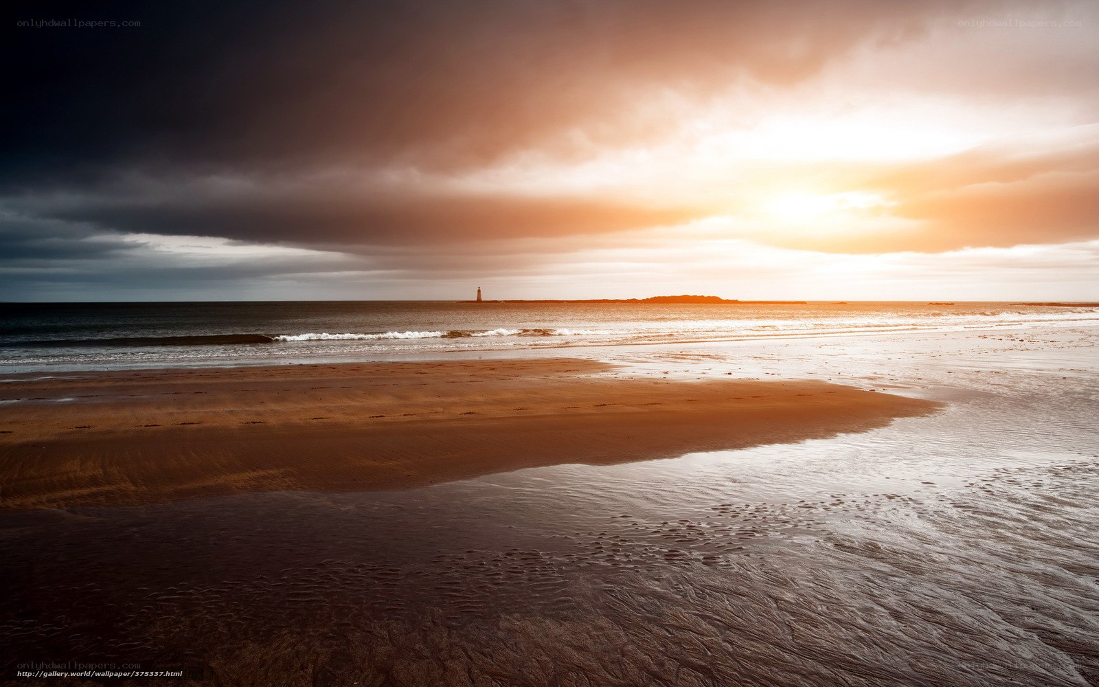 sunset at the beach with lighthouse