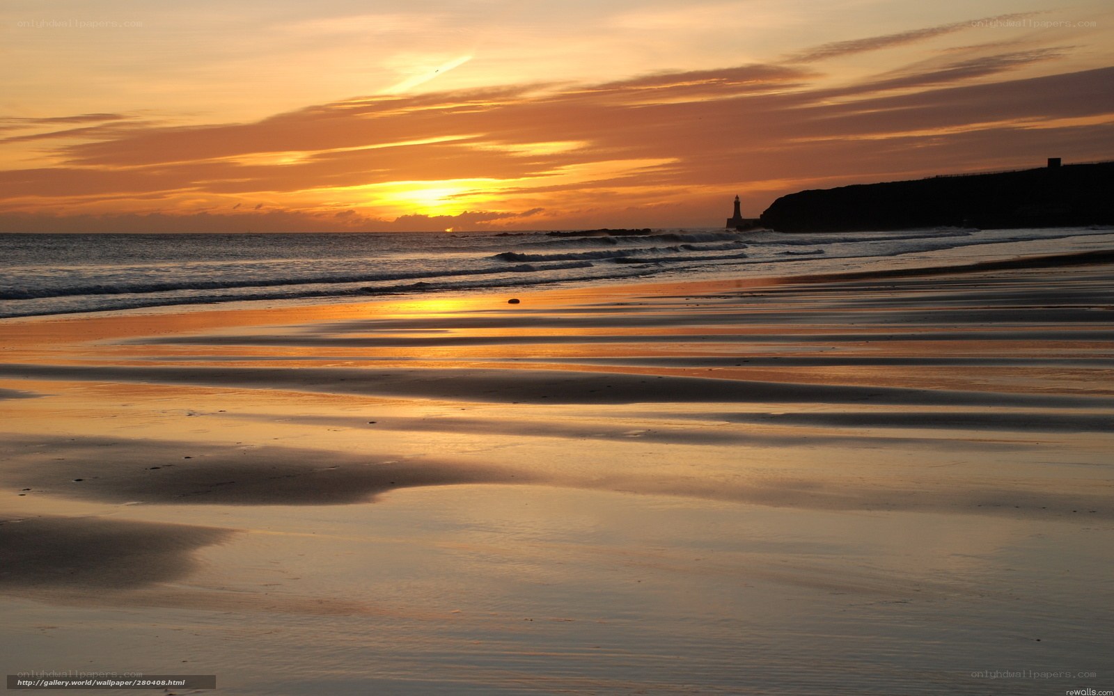 sunset at the beach with lighthouse