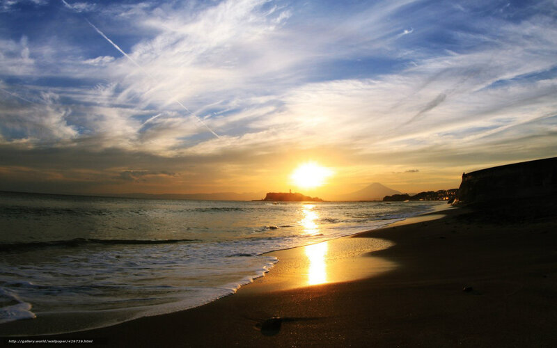 Sunset at the beach with mountain