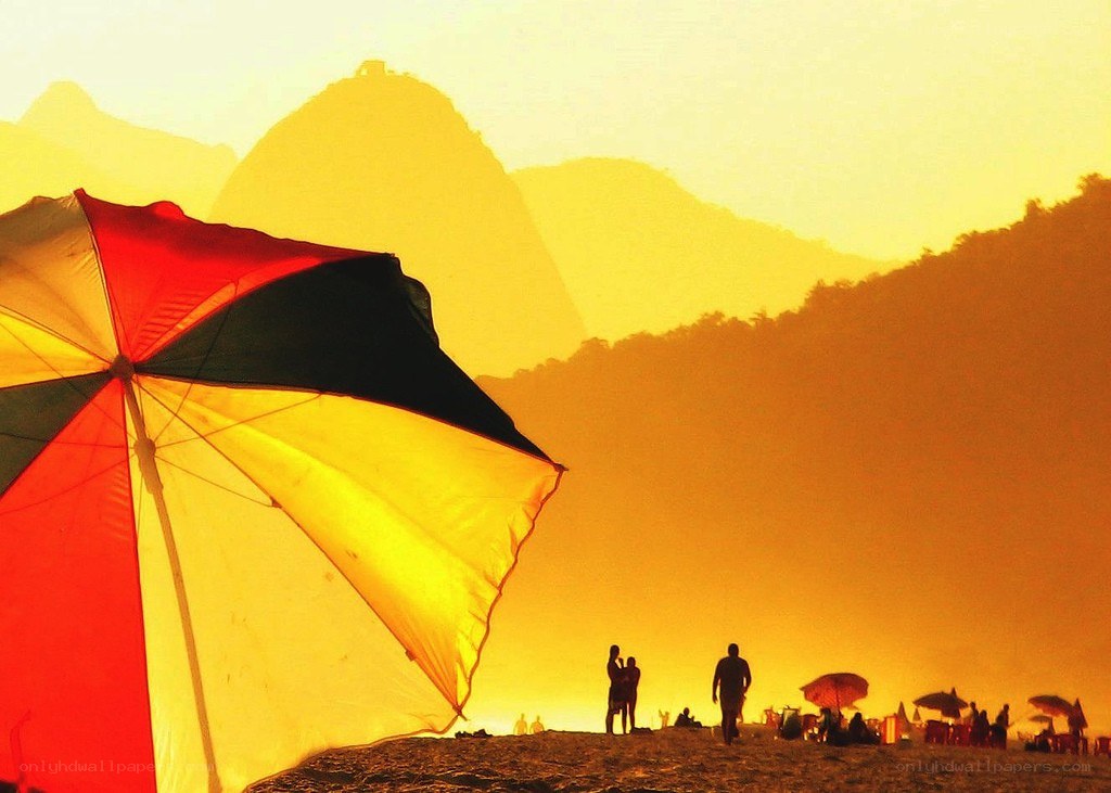 Sunset at the beach with mountains