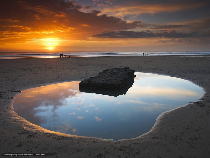 Sunset at the beach with reflection