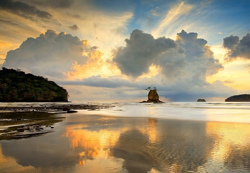 Sunset at the beach with rock formations