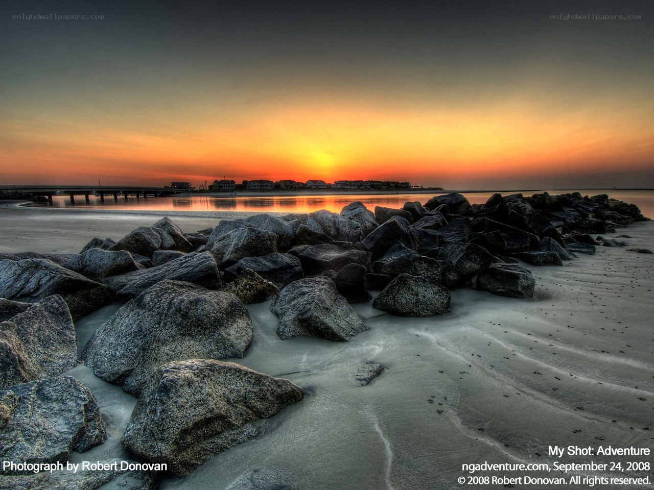 Sunset at the beach with rocks