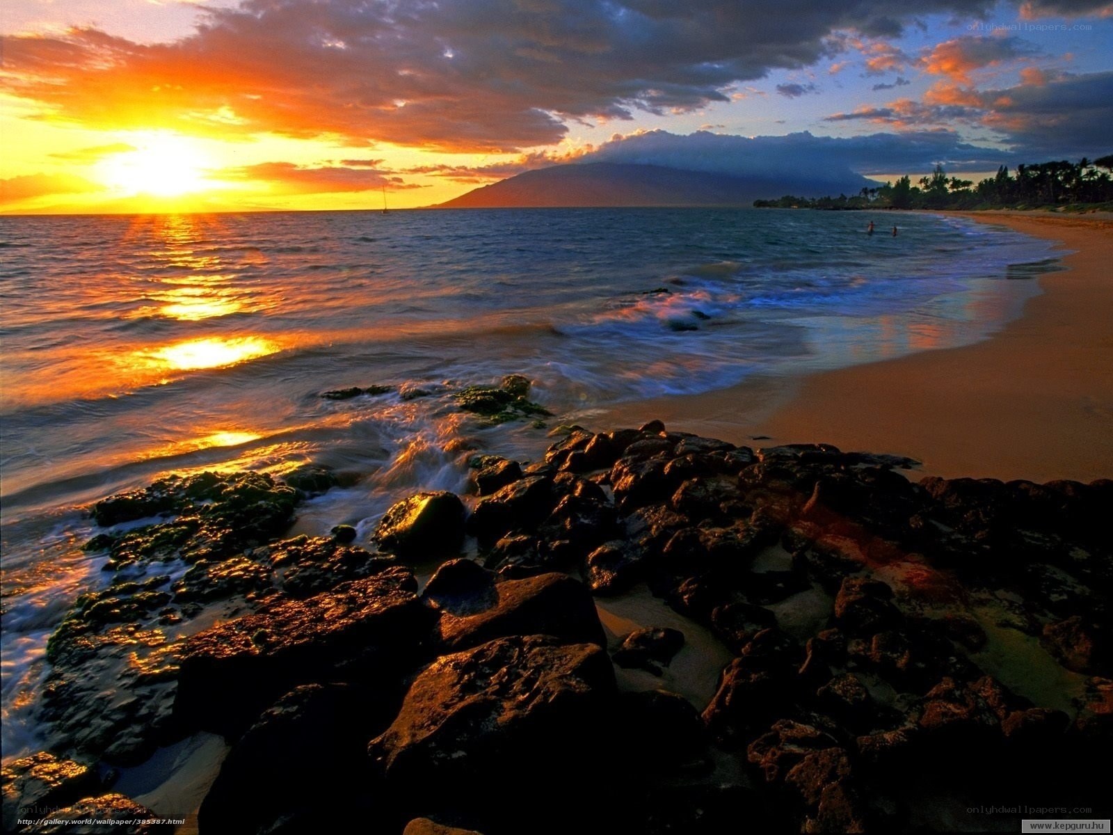 Sunset at the beach with rocks