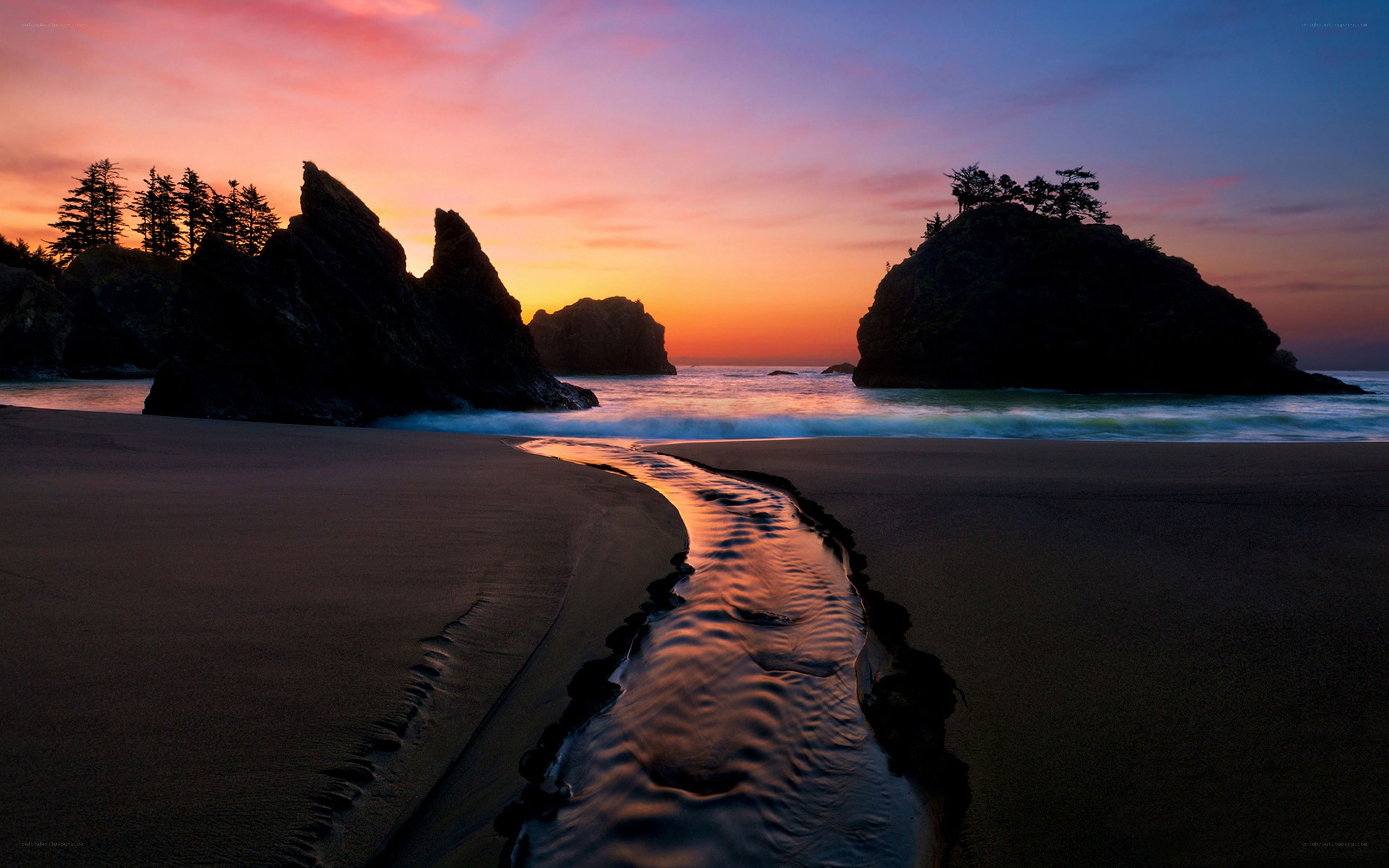 Sunset at the beach with stream