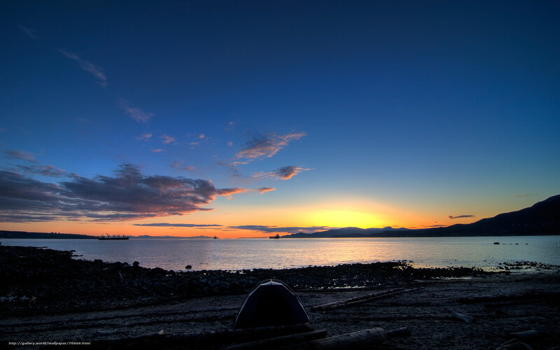 Sunset at the beach with tent