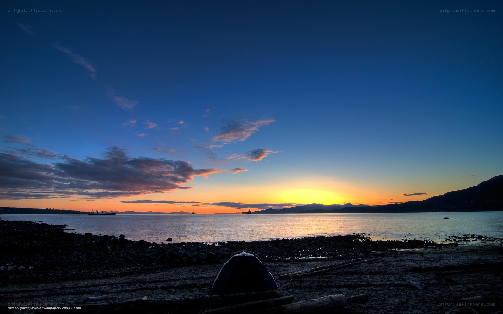 Sunset at the beach with tent