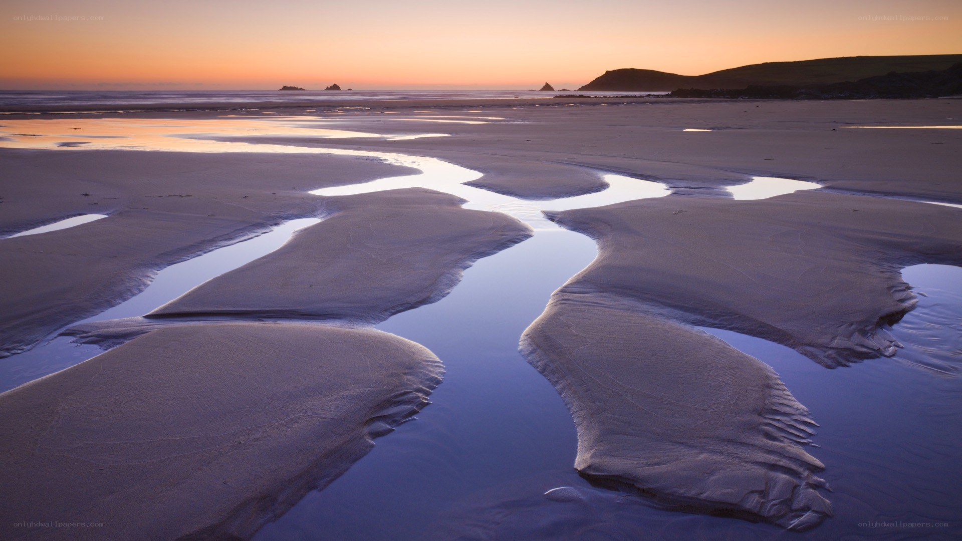 Sunset at the beach with tidal pools