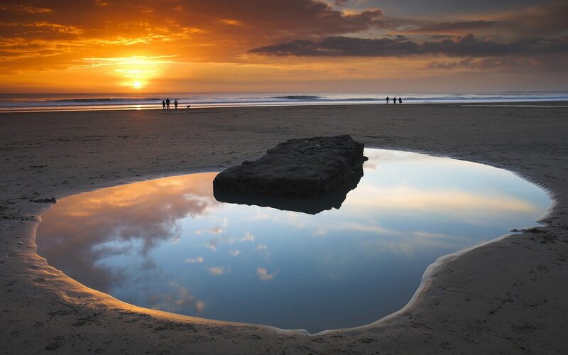 Sunset at the beach with tide pool