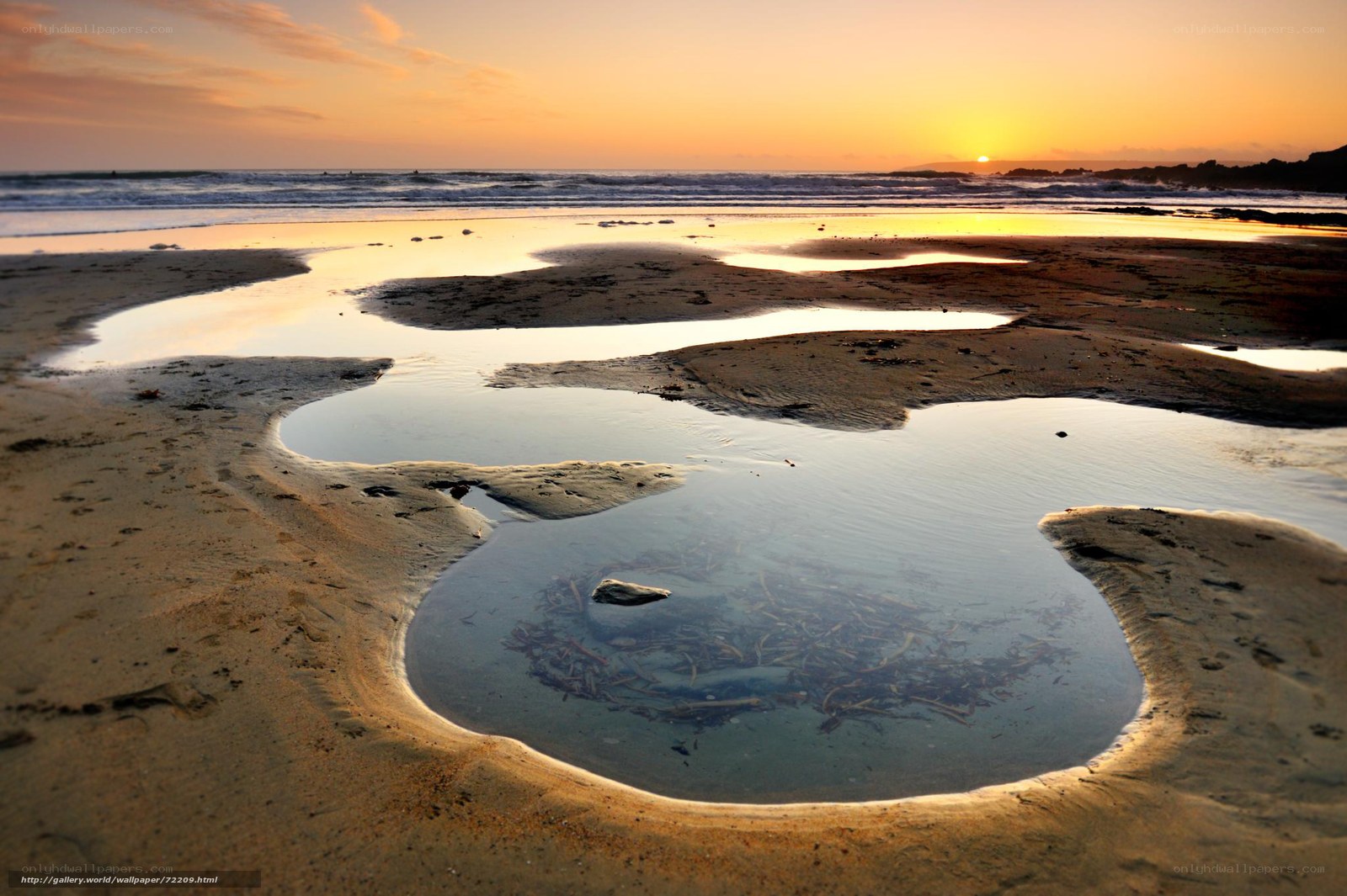 Sunset at the beach with tide pools