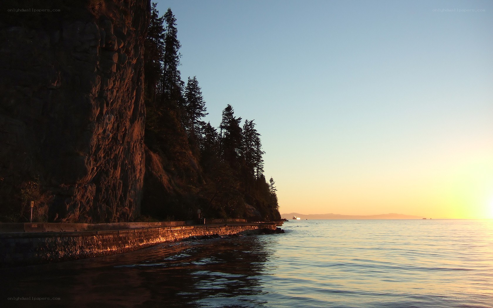 Sunset at the coastal cliff