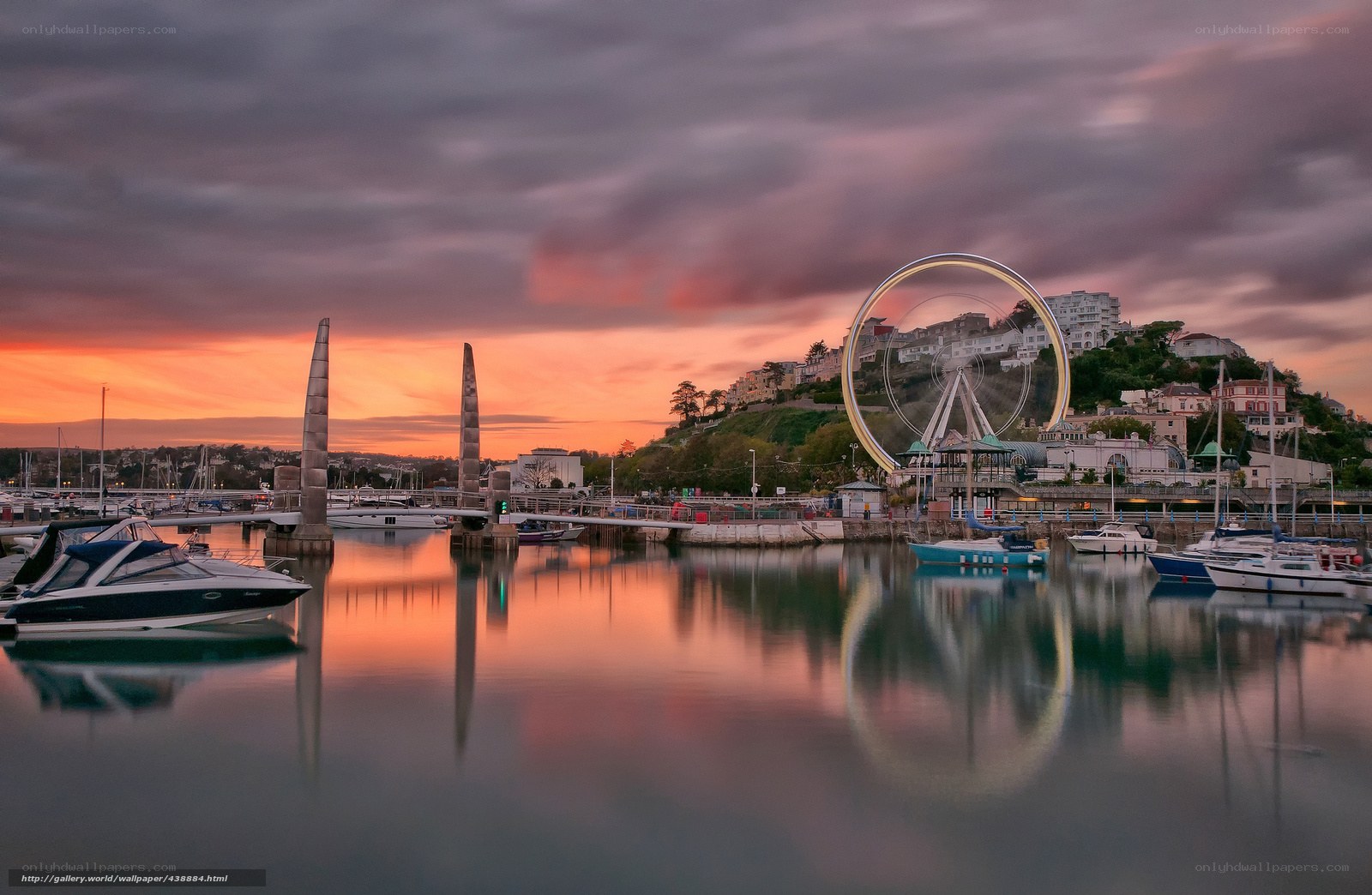 Sunset at the harbor with Ferris wheel