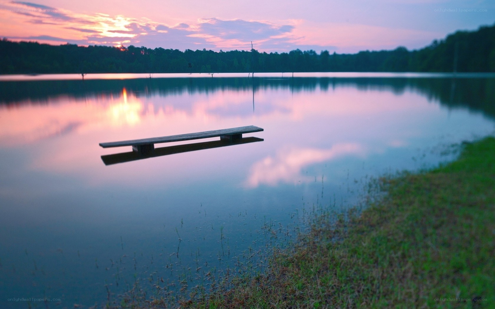 Sunset at the lake with a dock