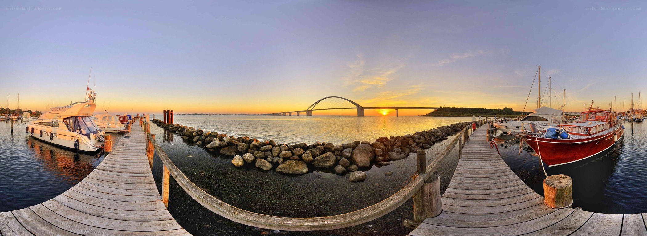 Sunset at the marina with bridge