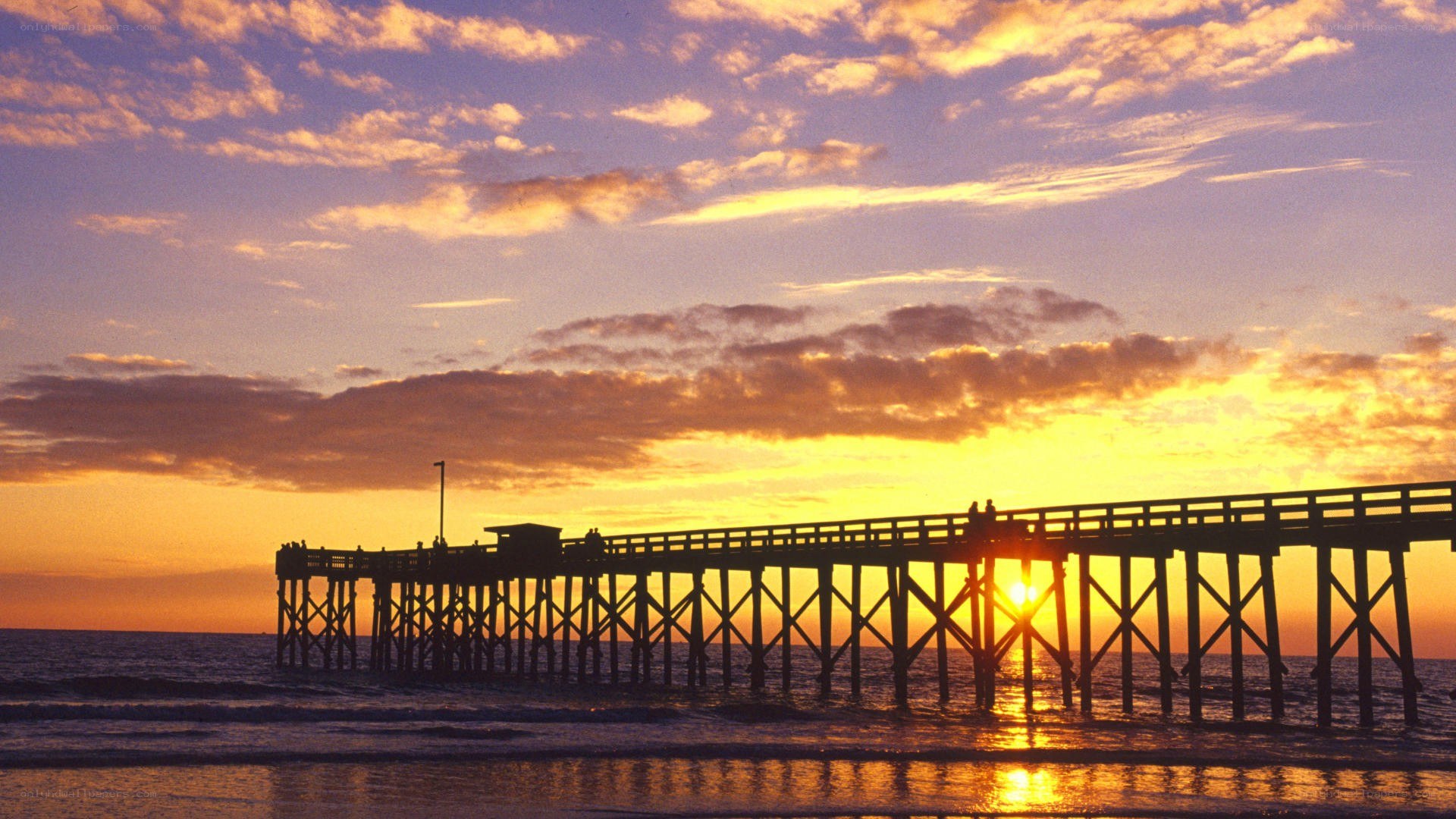 sunset at the ocean pier