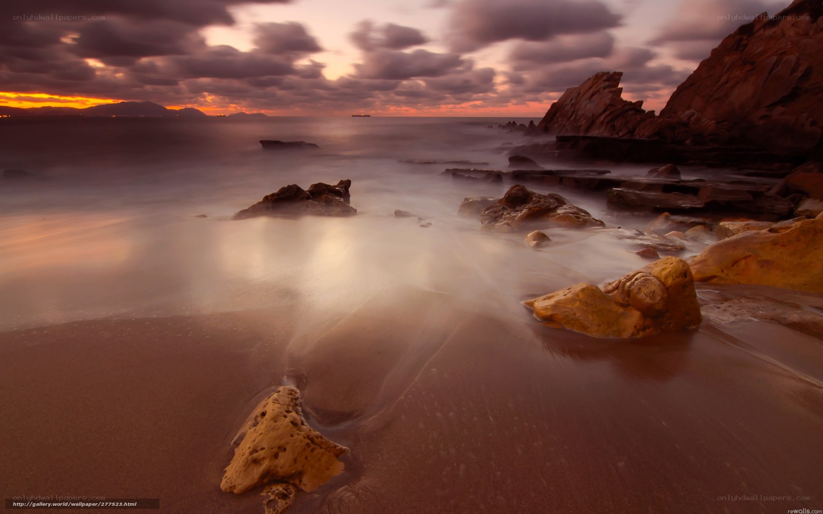 Sunset at the rocky beach